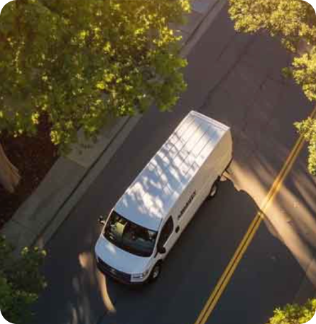 Fleet vehicle aerial view on road